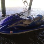 Affordable Jet Ski Rental Parked In Lake Under Dock